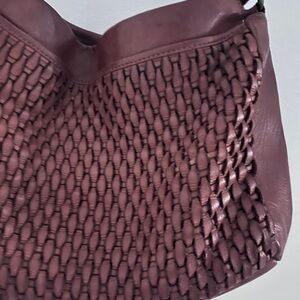 Marta Ponti Leather Triple
Compartment Crossbody With Woven leather